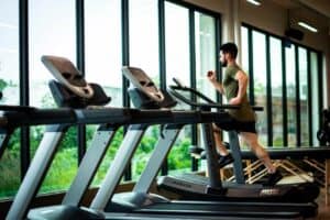 Photo of man running in the gym by William Choquette (Pexels)